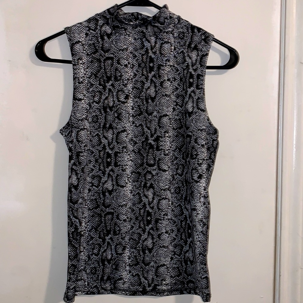 Nice blouse for a night out. Never worn